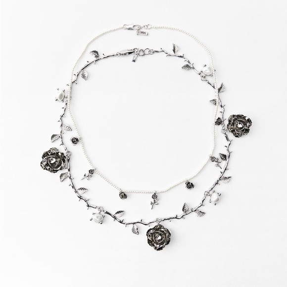 Zara Jewelry - NWT. Zara Set of two Necklace with beads and metal roses.